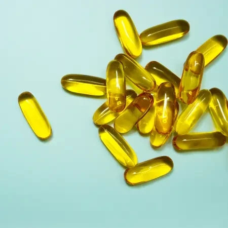 Omega-3 supplement capsules, eye health concept