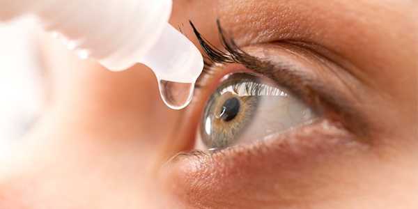 Close-up of eye receiving eye drops for dry eye relief