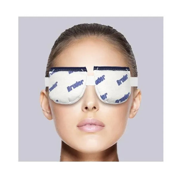 Woman wearing a Bruder warm compress eye mask for dry eye relief