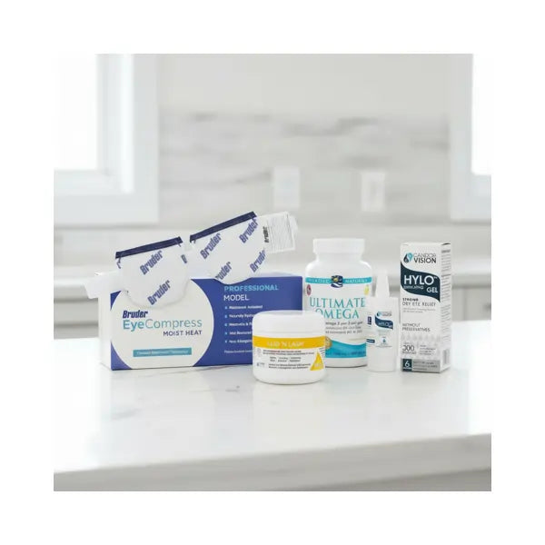 Dry eye relief products including eye drops, omega-3 vitamins, and moist heat compresses on a countertop