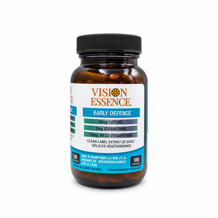 A bottle of Vision Essence Early Defence dietary supplement capsules, featuring an amber glass bottle, black cap, and a white label with blue and gray accents, set against a plain white background.